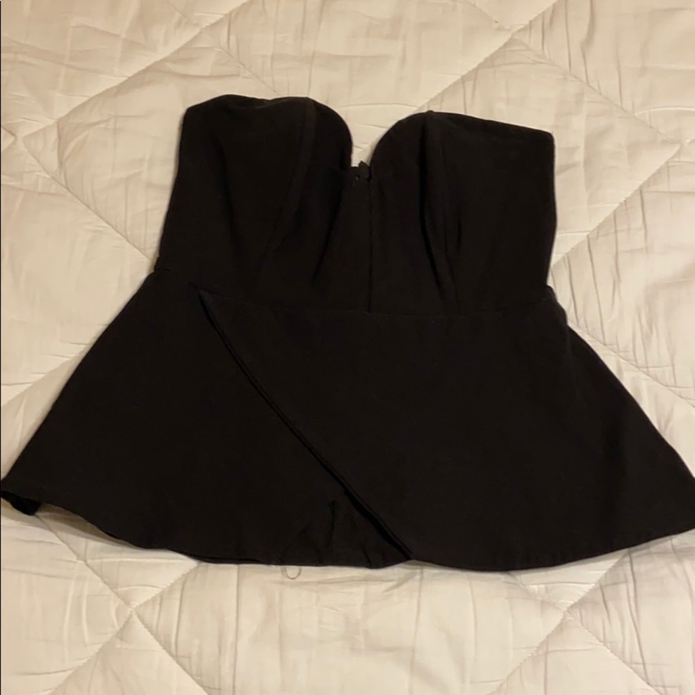 Black peplum style strapless top